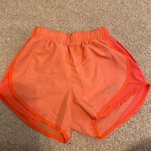 Orange Nike shorts